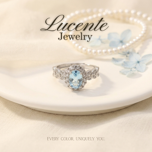Ethereal Oval Blue Topaz Leaf Vine Halo Ring