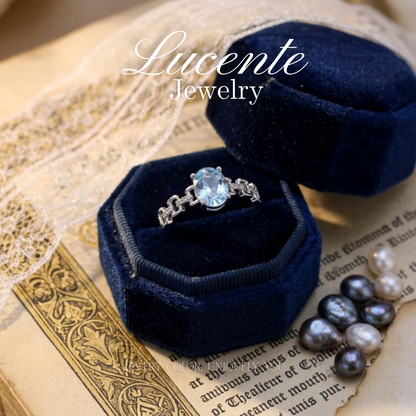 Chic Oval Blue Topaz Chain Link Ring
