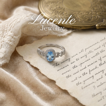 Exquisite Oval Sky Blue Topaz Halo Ring