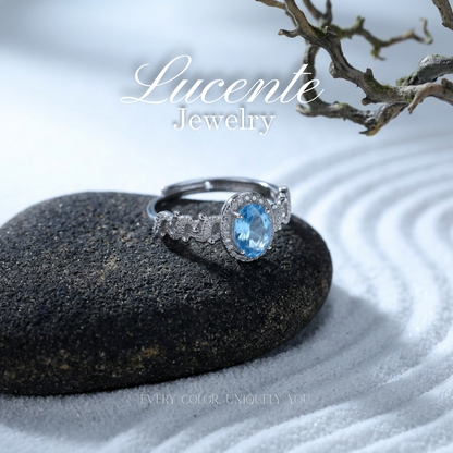 Exquisite Oval Sky Blue Topaz Halo Ring